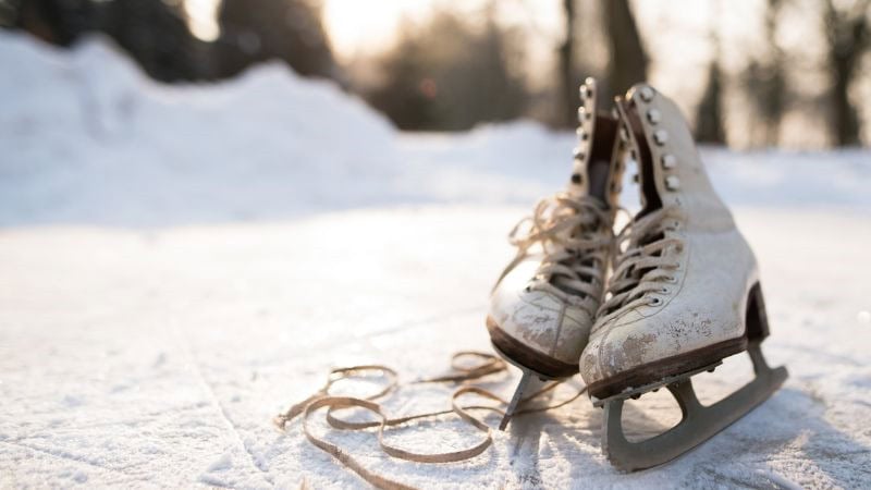 A pair of skates on the snow