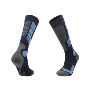 Dark blue knee-high Merino wool ski socks with light blue and gray patterns, ideal for cold-weather snowboarding.