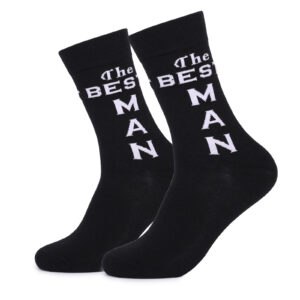 Sinoknit black dress socks for weddings with "The Best Man" in white. Stylish, playful, and perfect for adding fun to wedding attire.