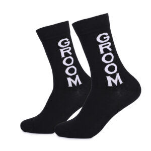 Black socks with "GROOM" in bold white letters down the sides,